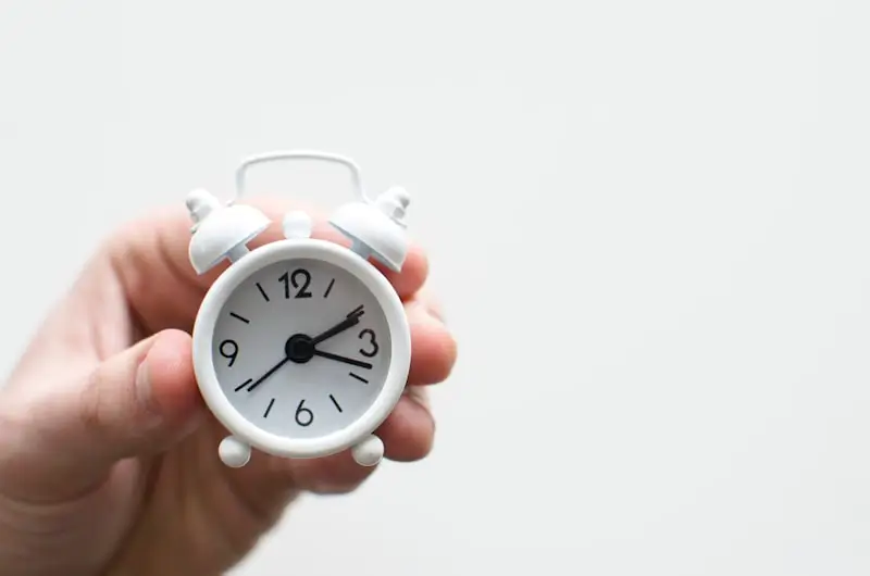 Night shift sleep guide — alarm clock and tea